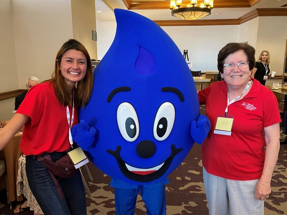 dr. megdal with drippy mascot
