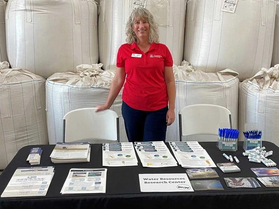 photo of WRRC Associate Director Jamie McEvoy tabling at BKW farms