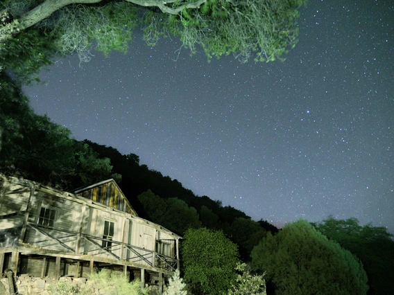 photo showing a cabin at night