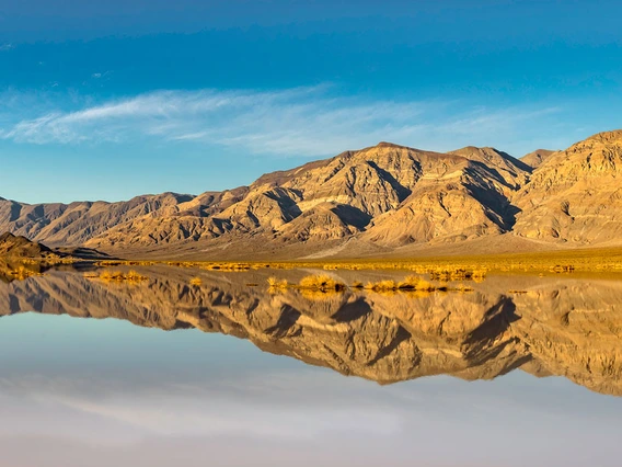 Mountains reflecting in lake
