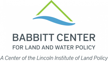 babbitt center logo - blue water streak with abstract green peak over it
