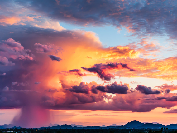 Brian Anderson Photo showing a beautiful cloud burst at sunset with various gradients of color
