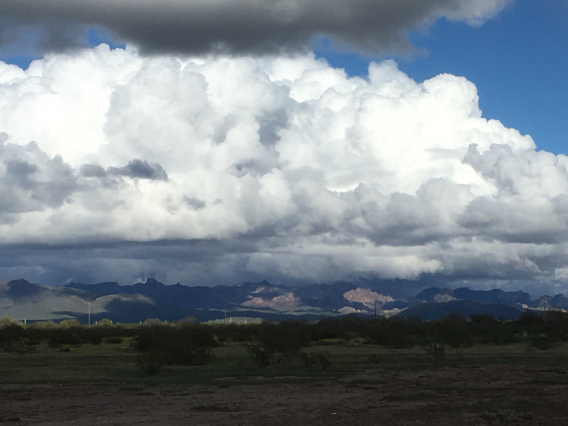 Lonnie Frost photo of storm clouds over the pinal mountains