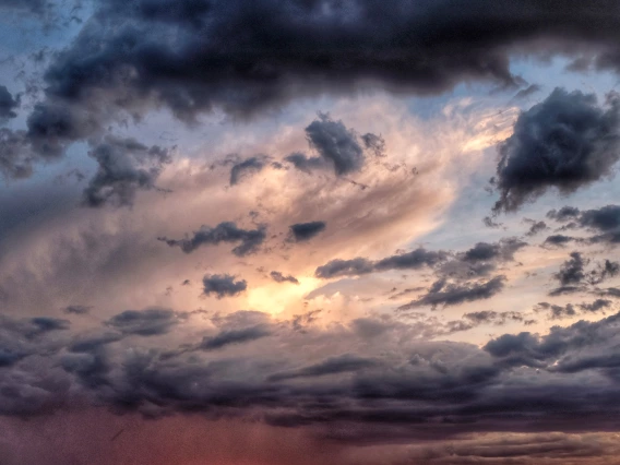 a photo of an arizona sunset with reds and purples