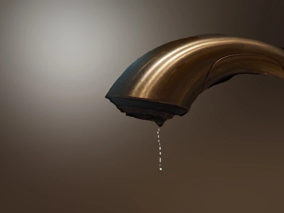 photo of a dripping faucet