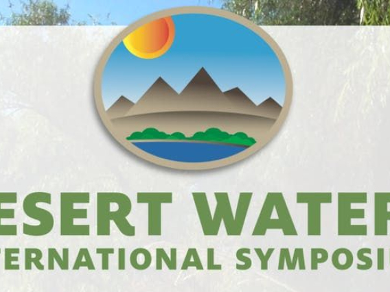water symposium header image mountains, sun and river