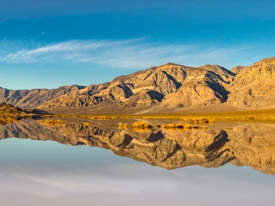 Mountains reflecting in lake