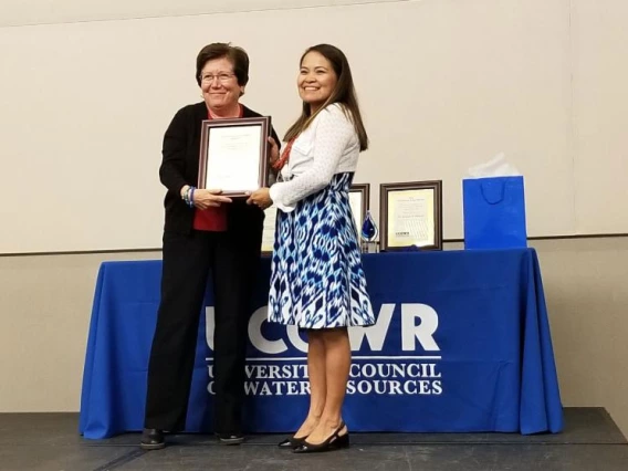  Karletta Chief presenting an award to Sharon B. Megdal