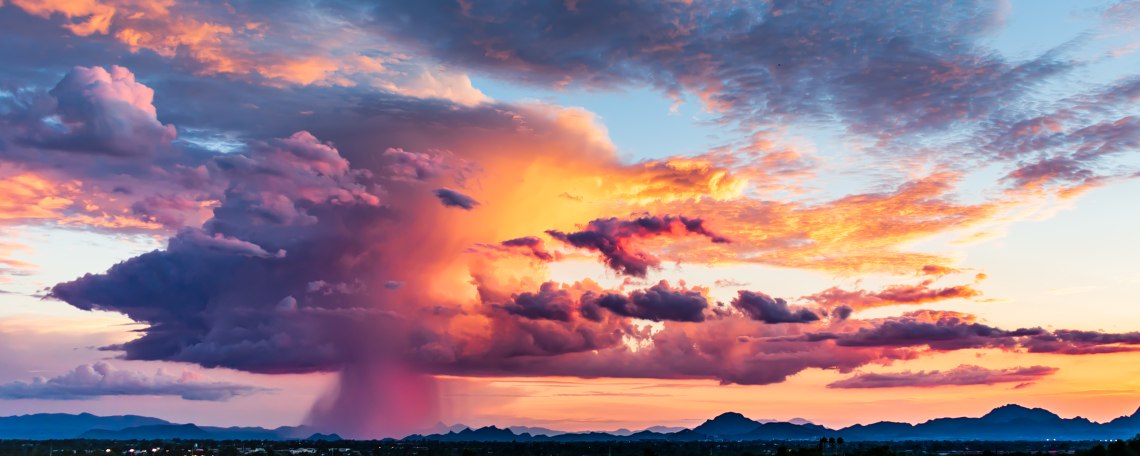 Brian Anderson Photo showing a beautiful cloud burst at sunset with various gradients of color