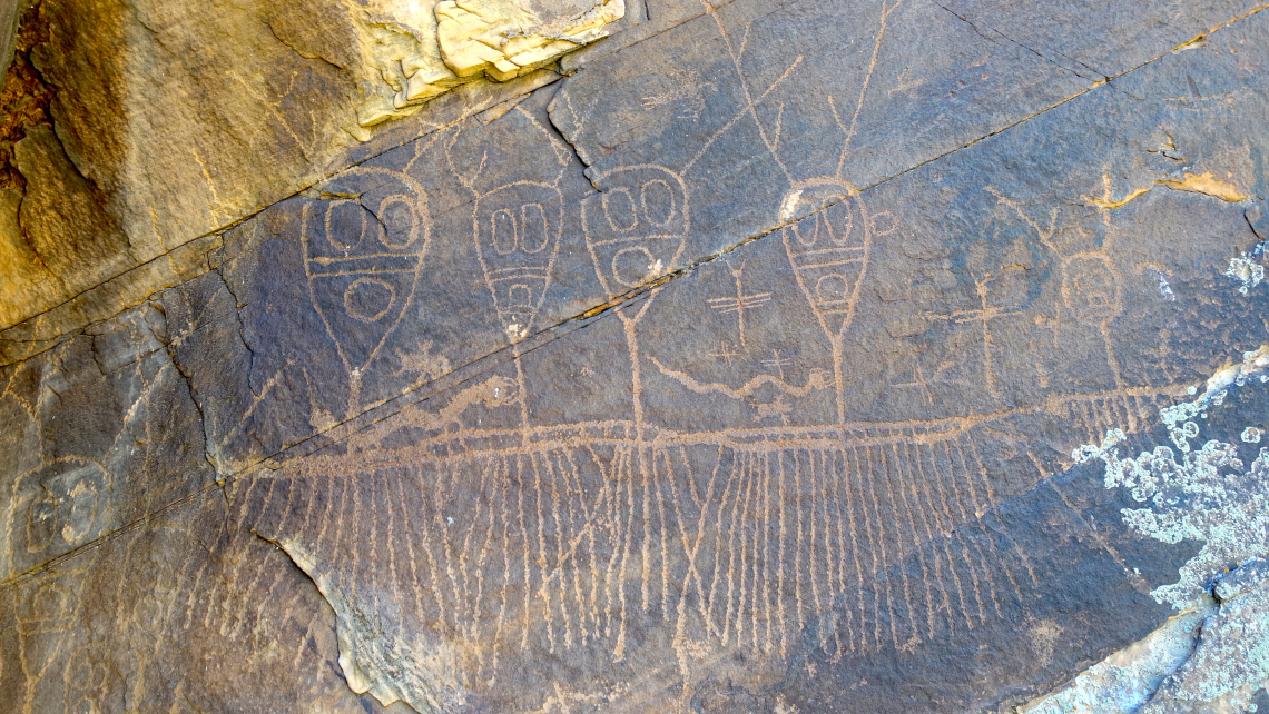 Peter Blystone photo showing Petroglyphs symbolizing rain carved on a  on a rock