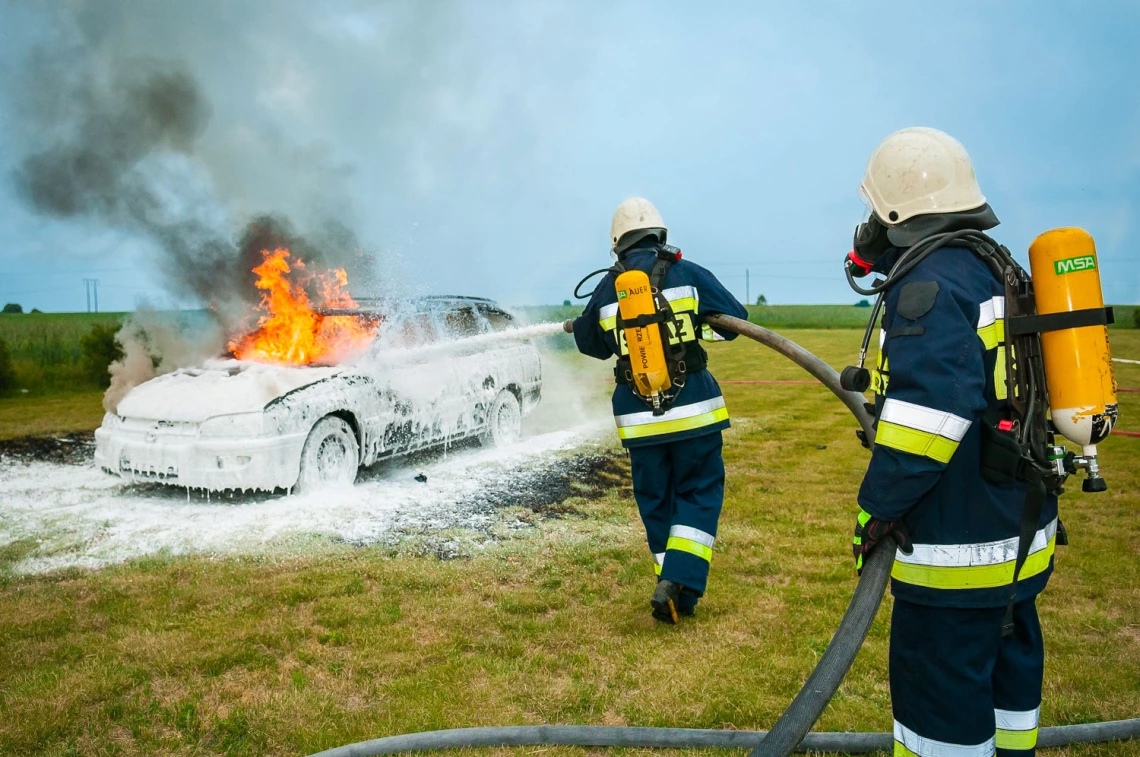 photo of firefighters using flame retardant