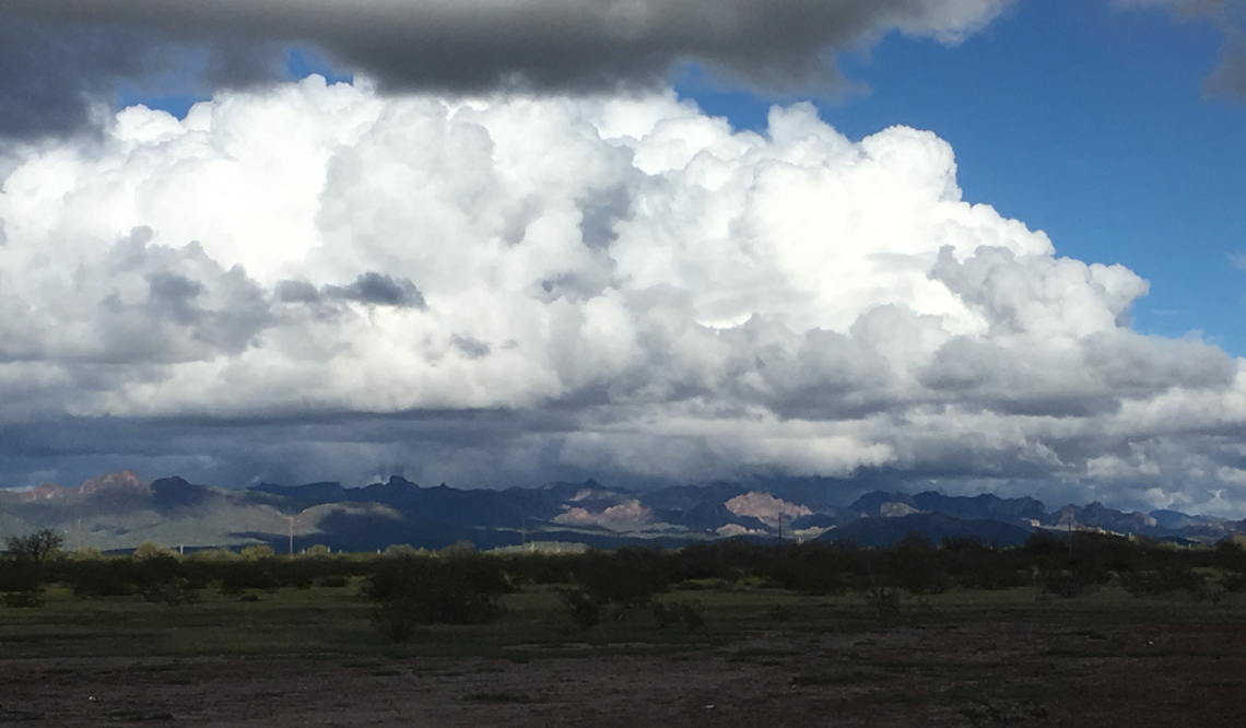 Lonnie Frost photo of storm clouds over the pinal mountains
