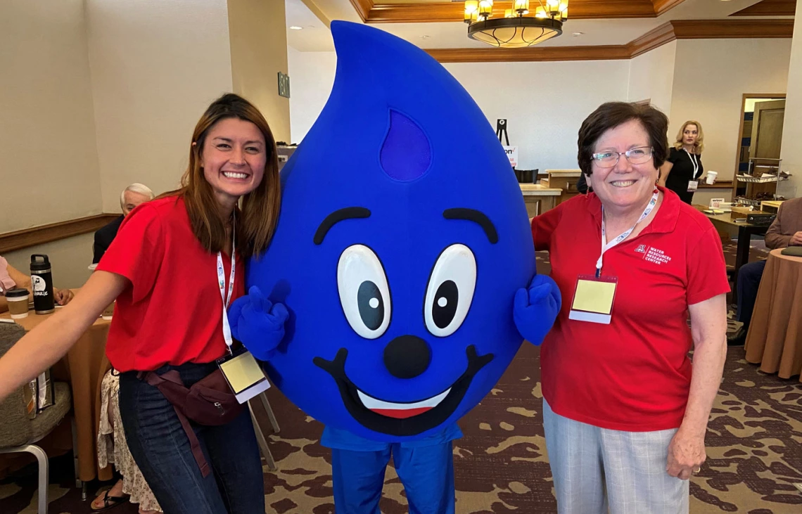 dr. megdal with drippy mascot