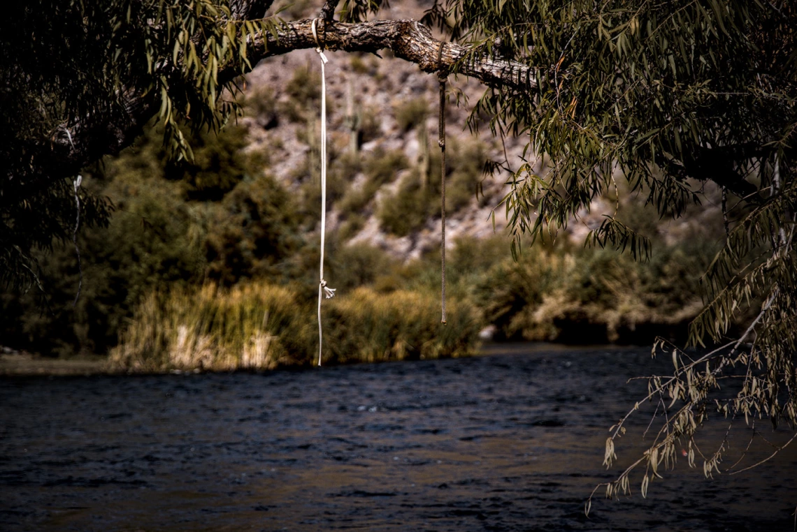 photo of a rope used by people to jump into the salt river