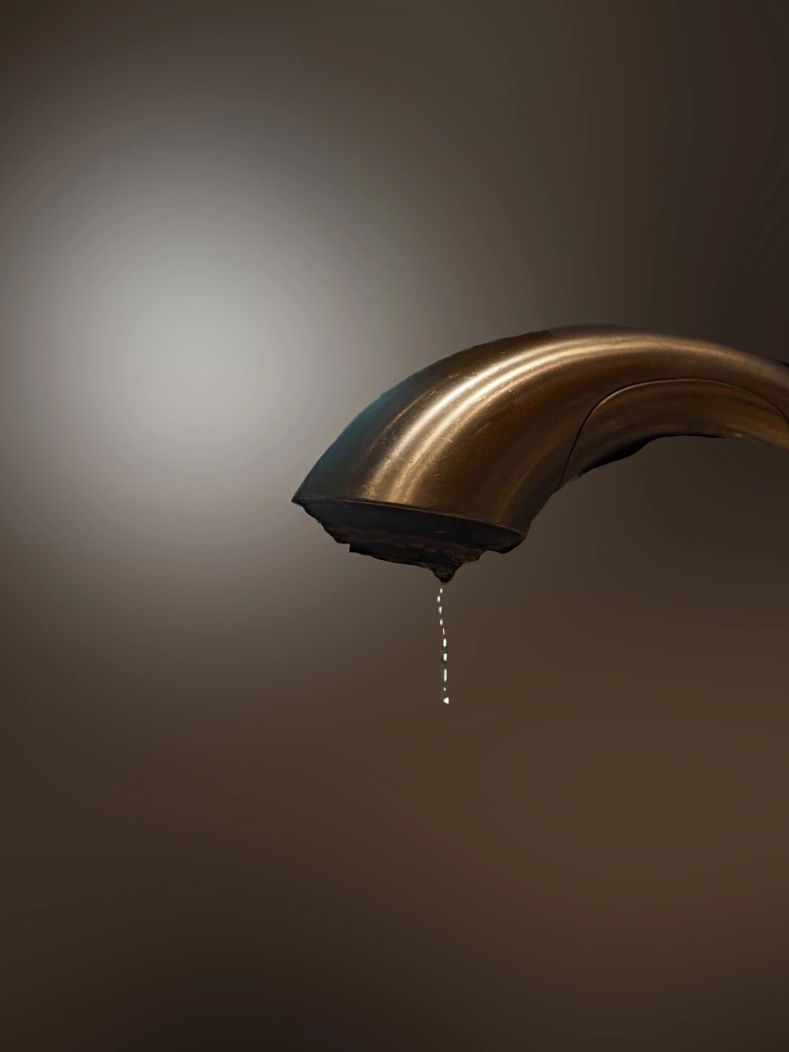 photo of a dripping faucet