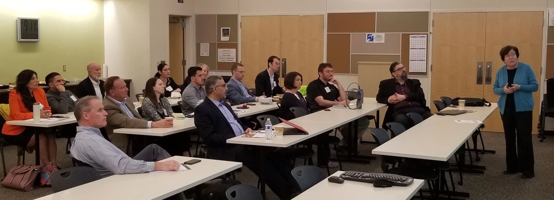 Sharon B. Megdal lecturing to a group of Canadian delegates