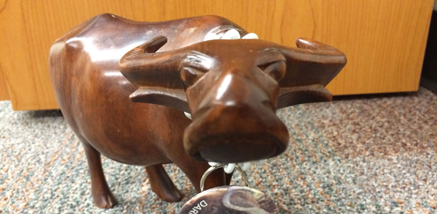 wooden water buffalo sculpture