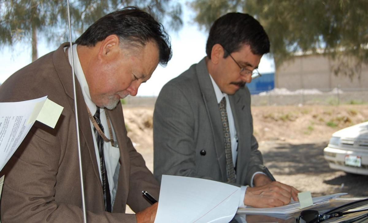Signing Ceremony at Boundary Monument #1 in El Paso/Juarez. Principal Engineers John Merino and Luis Antonio Rascón Mendoza. August 19, 2009
