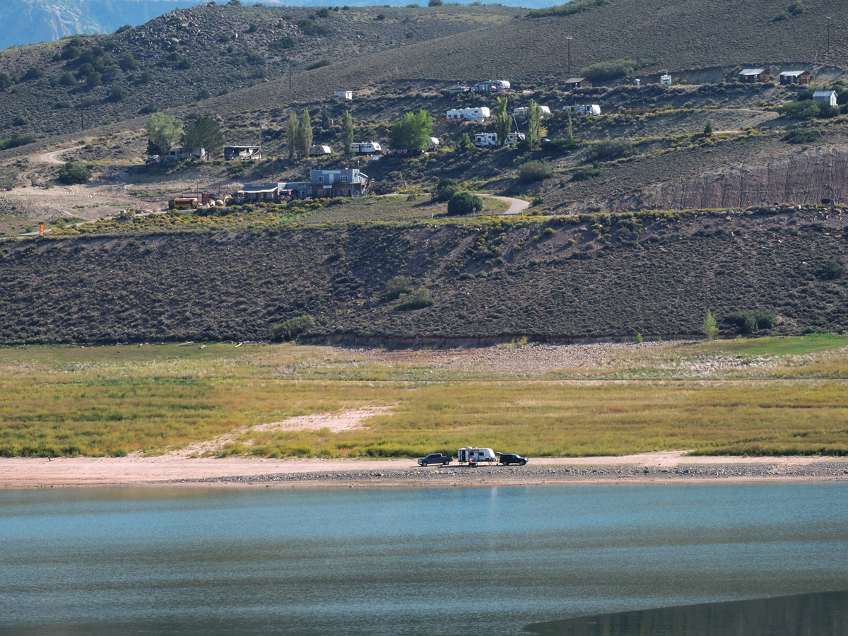 photo showing campers near the water's edge at blue mesa reservoir