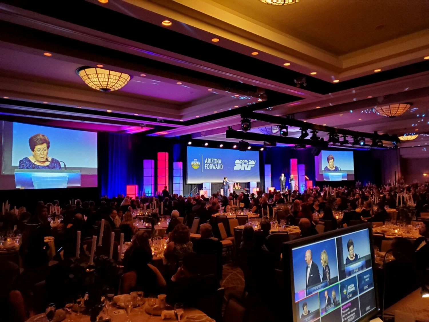 photo of crowd and screens from gala event