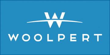 woolpert logo - w with arc through it on blue background