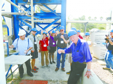 Sharon Megdal toasts “L’Chaim” with desalinated seawater with her colleagues at a desalination plant in Hadera, Israel